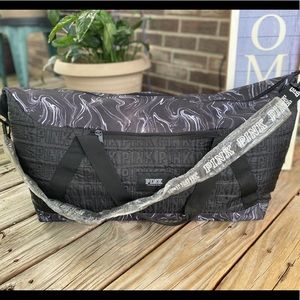 Very large Victoria Secrets “Pink” weekender bag.